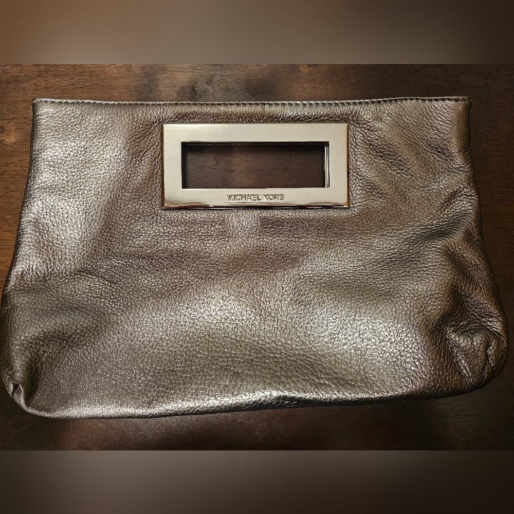 Michael kors metallic grey leather top handle frame clutch